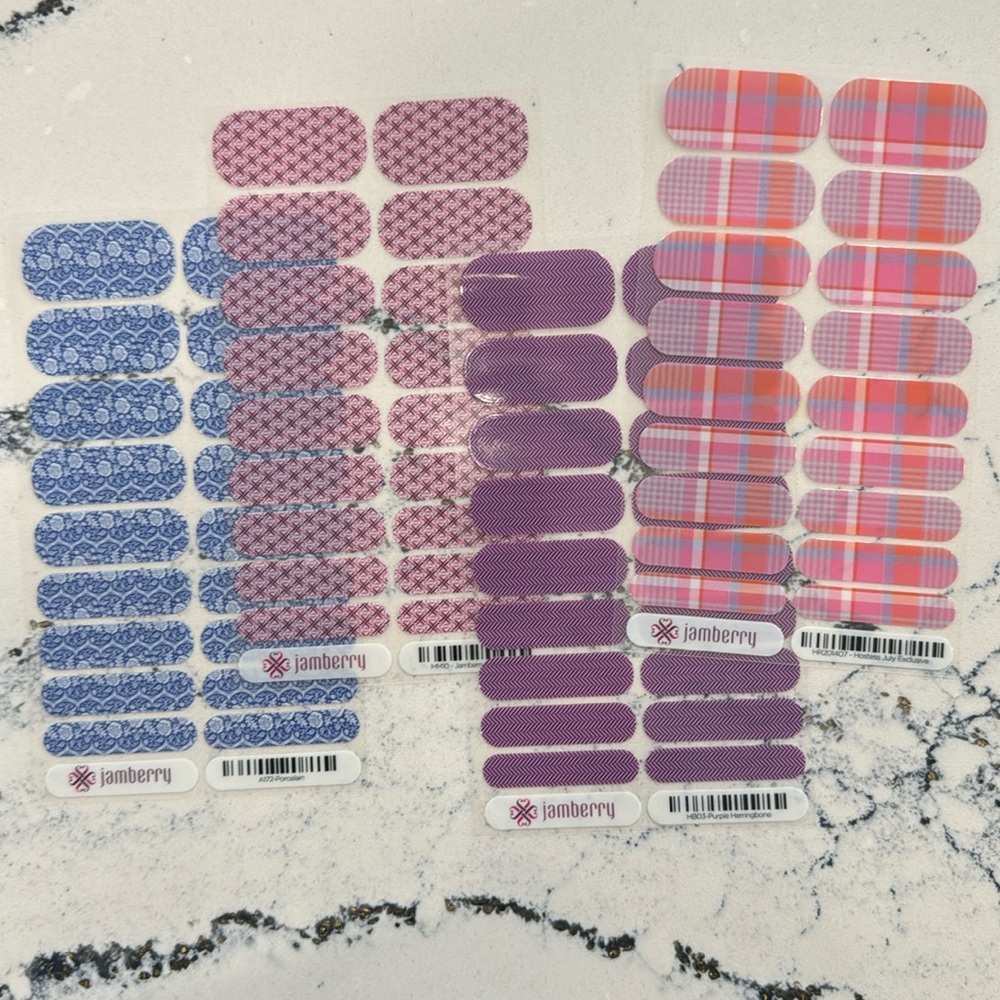 4 new sheets of Jamberry Nail Wraps